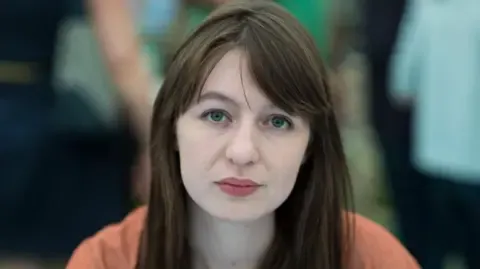 The acclaimed novelist claims she will not enter the UK over legal concerns